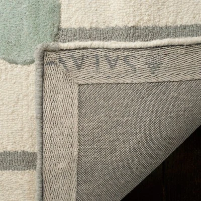 Safavieh Kids SFK909 Hand Tufted Area Rug - Safavieh 3 Safavieh Kids SFK909 Hand Tufted Area Rug - Safavieh - Image 3